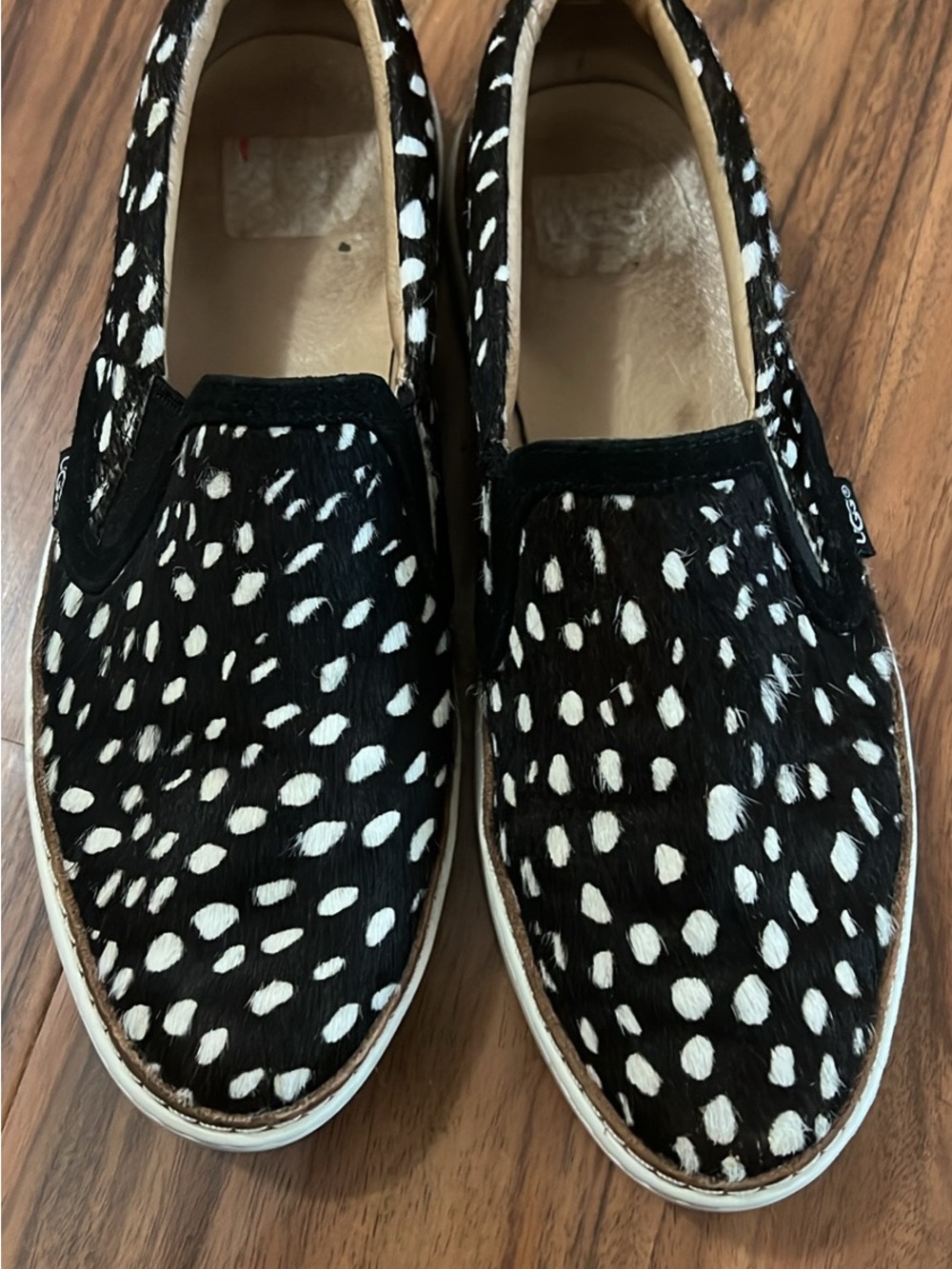 UGG Women's Soleda Exotic Black Cow Hair Slip-On Sneakers Size 6.5